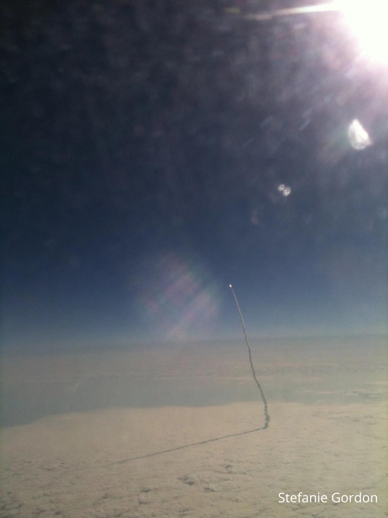 Photo of the launch of the Space Shuttle Endeavor from passing Delta flight 2285 on May 16, 2011
